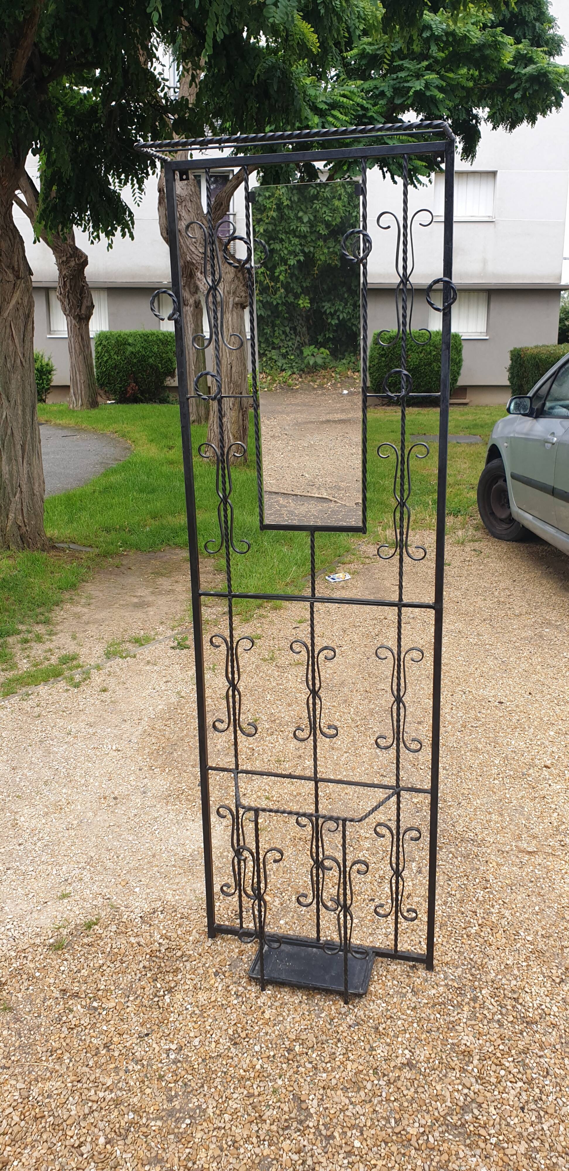 Wrought iron coat holder