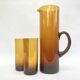 Carafe/pitcher and two amber glasses • Blown glass • France • 1970s