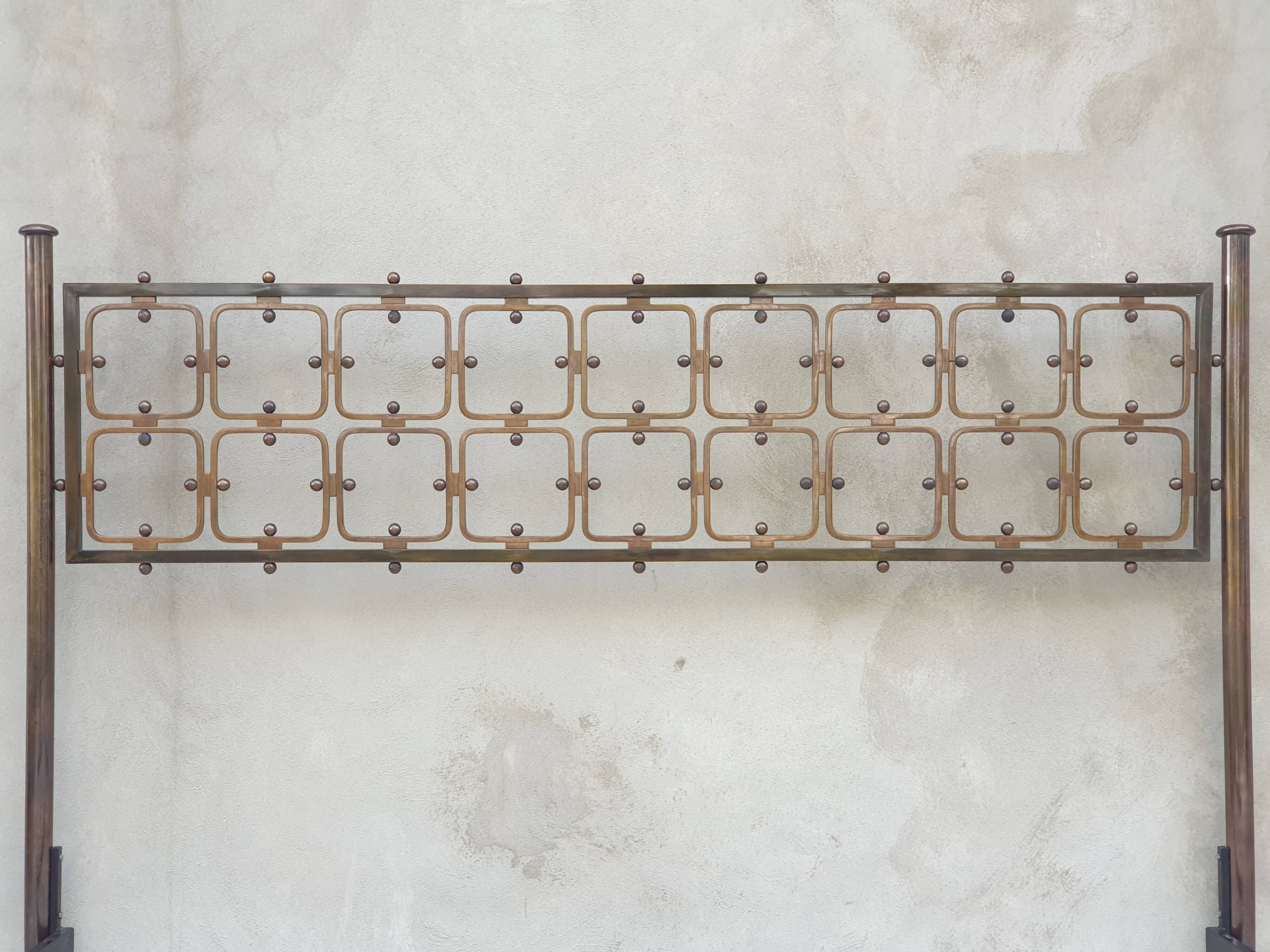 Double bed in burnished brass