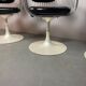 A striking set of four vintage swivel dining chairs