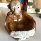 Pipe holder, ashtray or monkey pocket emptier