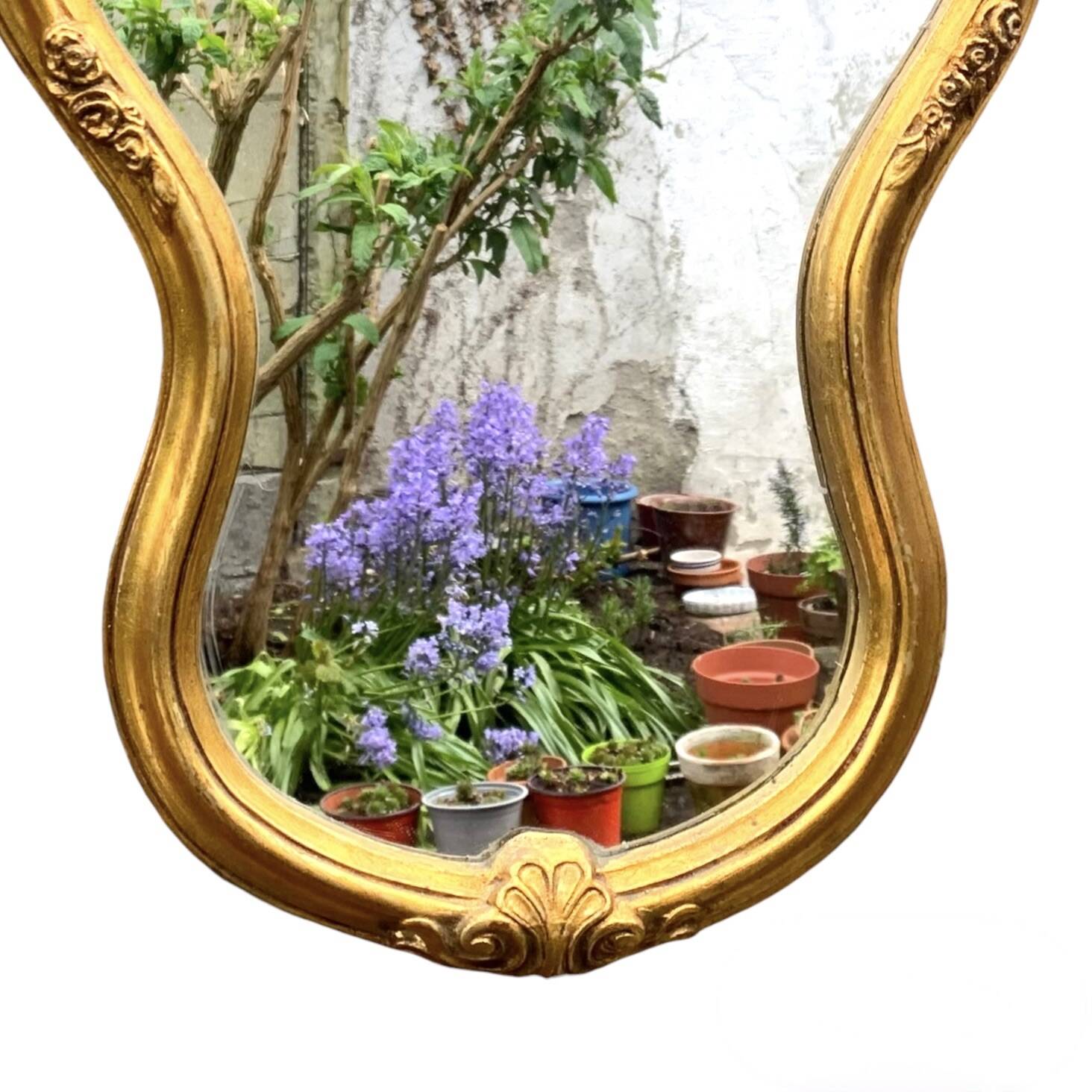 Large rococo mirror in gilded wood