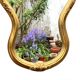 Grand miroir rococo en bois doré