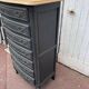 Louis XV style chest of drawers, black patina.