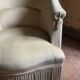 Old toad armchair in beige velvet