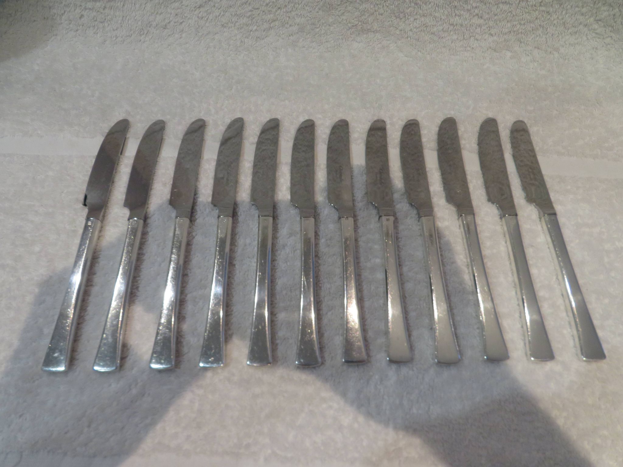 12 Christofle Concorde silver plated dessert knives, 19cm