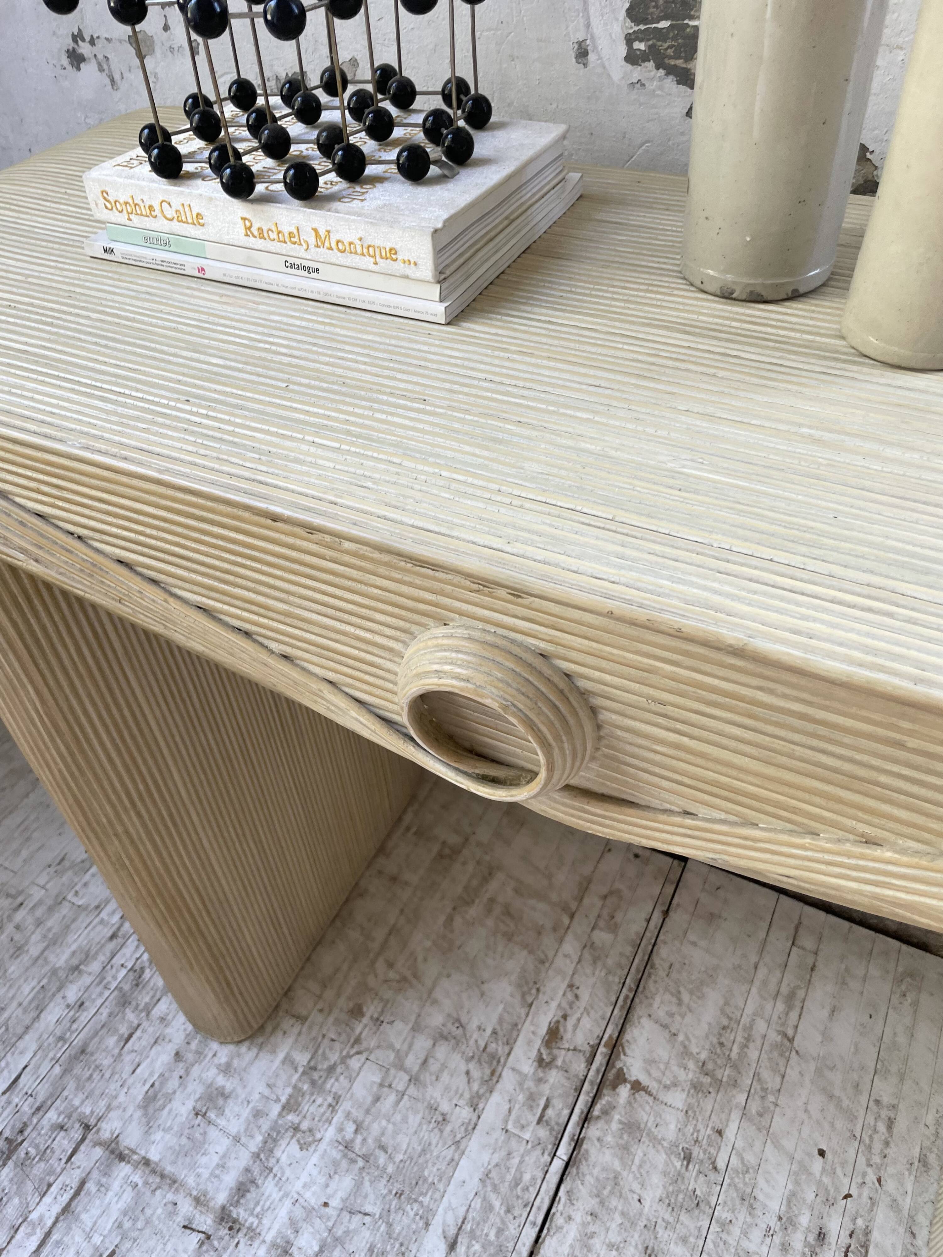 70s console in tropicalist rattan