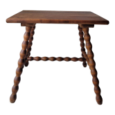 Table basse brutaliste pieds torsadés