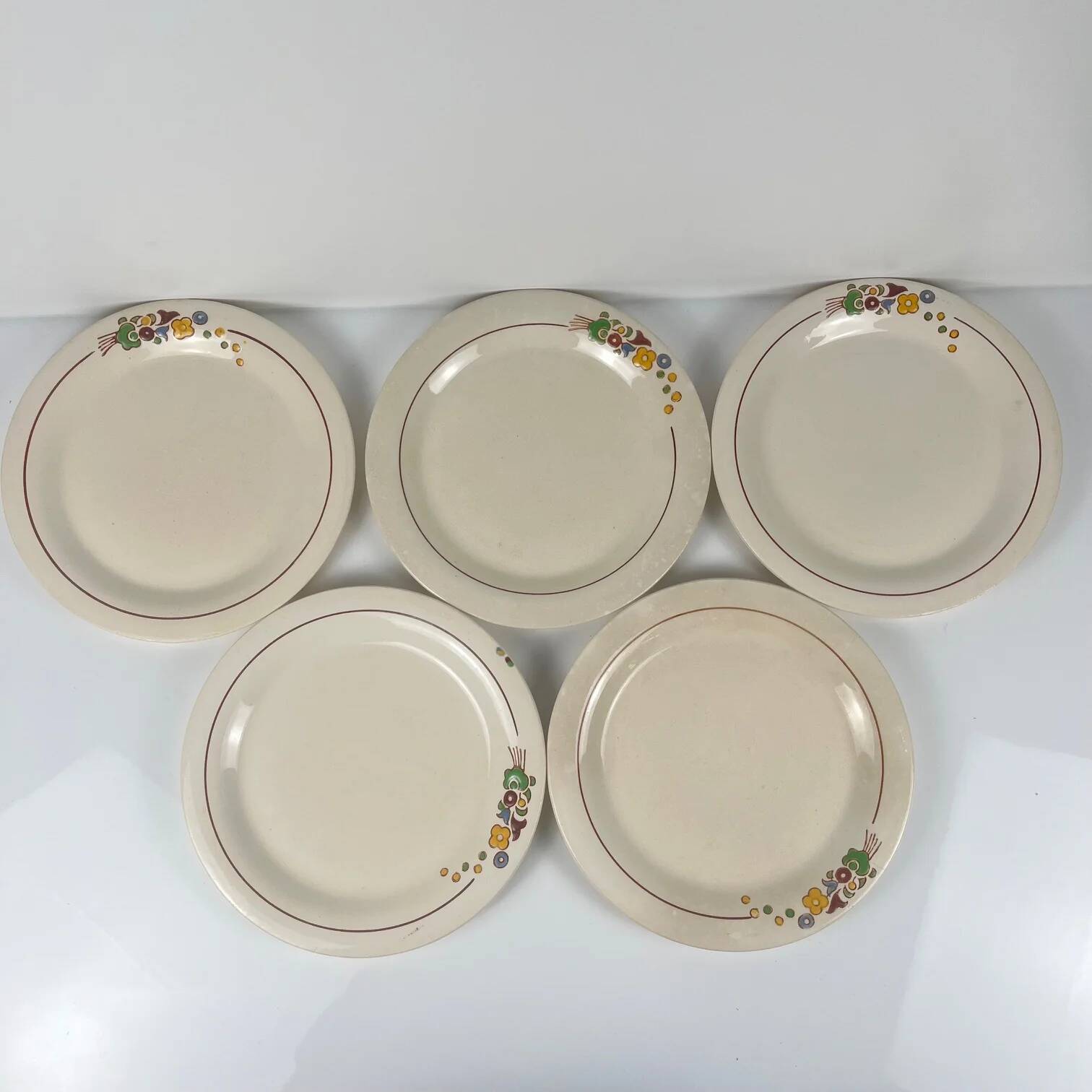 Set of 5 dessert plates Longwy, early 20th century, floral decoration.