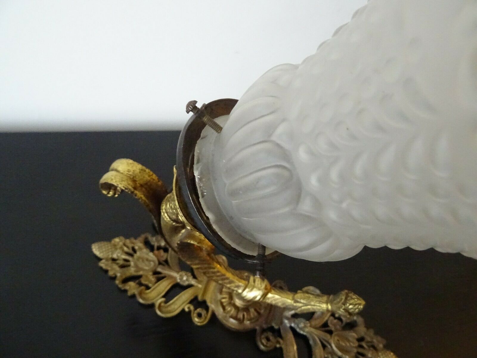 Old wall lamp, bronze frame and glass tulip