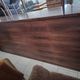 Scandinavian sideboard in dark red wood and leather, 1960s vintage modernism