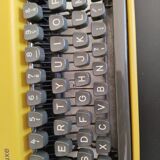 Vintage yellow portable typewriter, functional, AEG, new ribbon