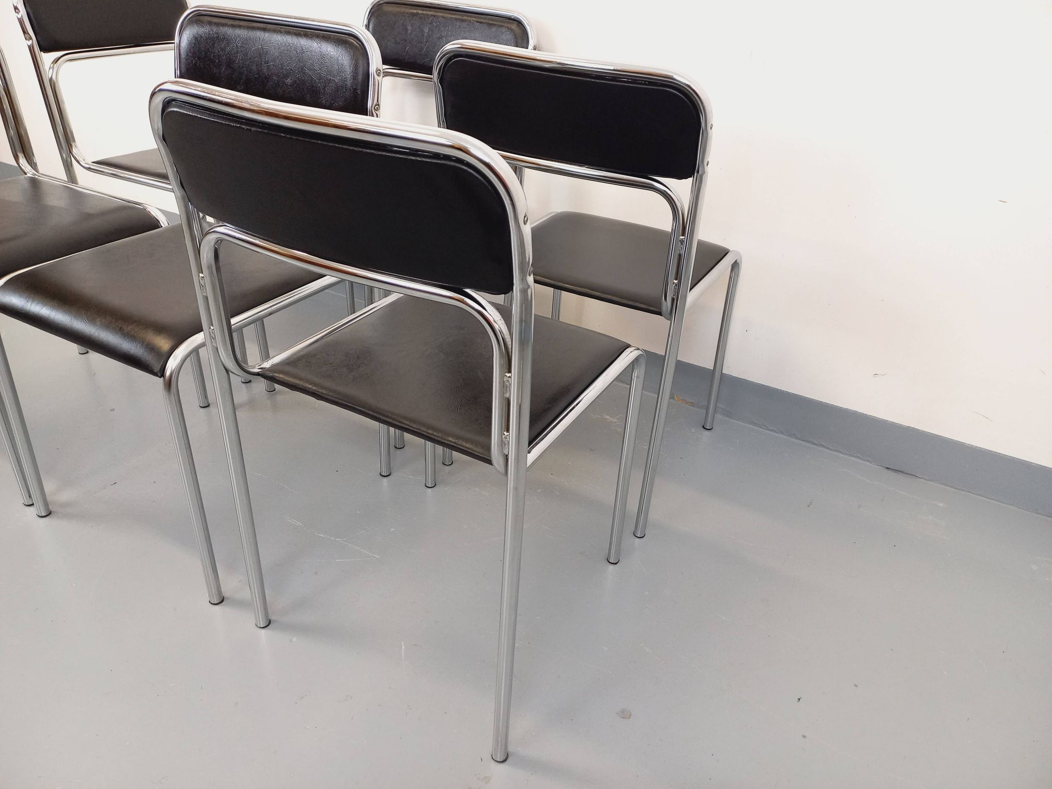 Set of 6 vintage Italian stackable chairs in chrome metal and skai.