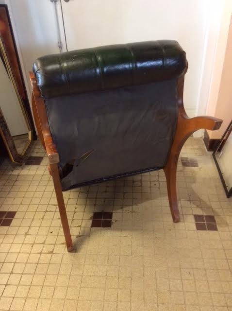 Green Chesterfield armchair