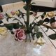 metal chandelier and porcelain flowers
