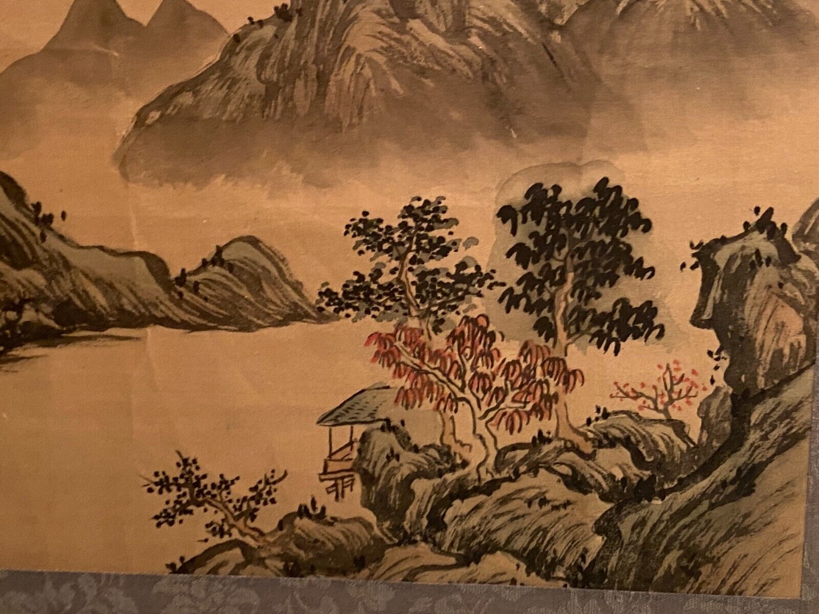 India ink drawing with red markings depicting a mountain landscape