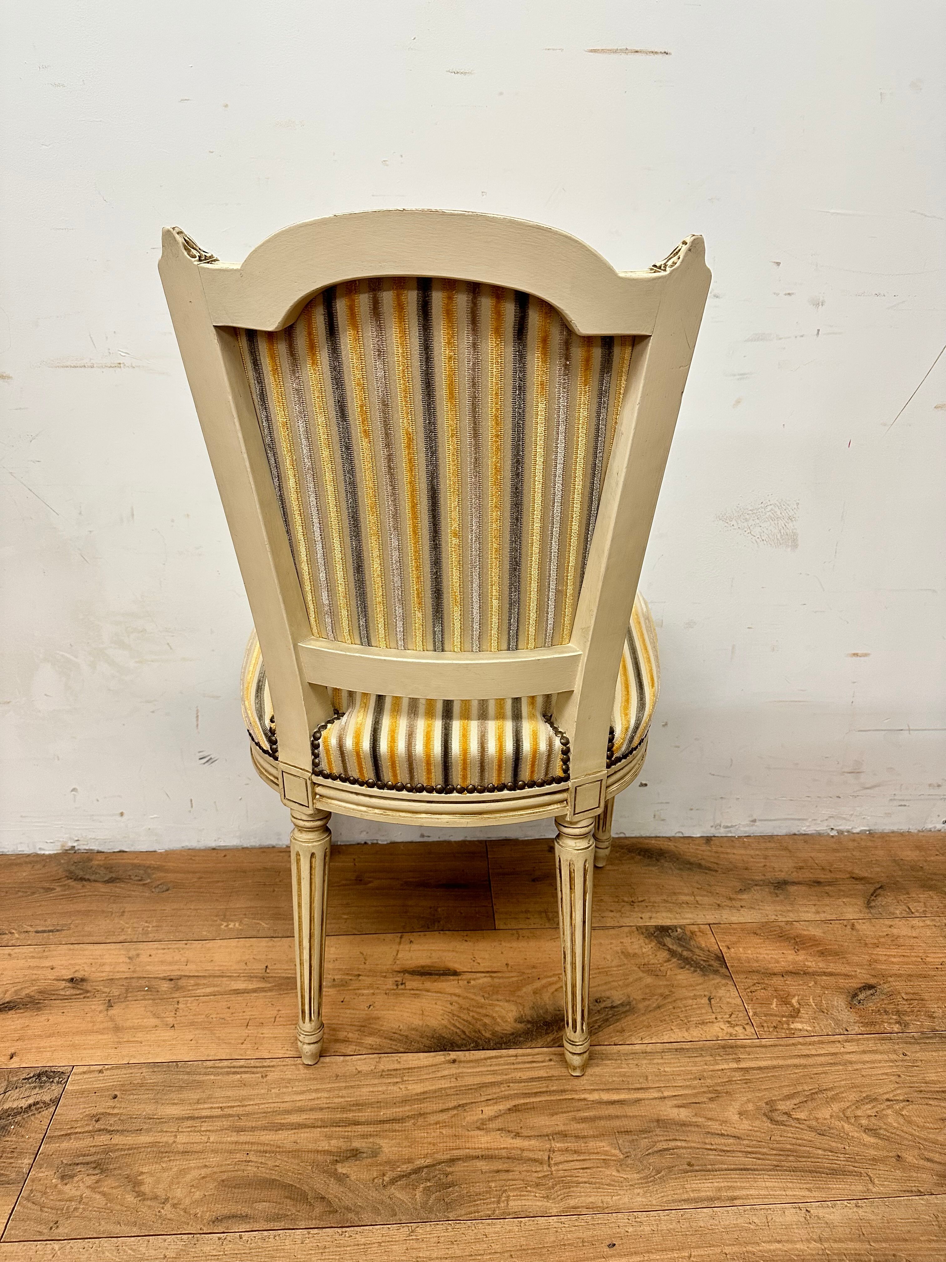 2 convertible armchairs and 2 Louis XVI style chairs