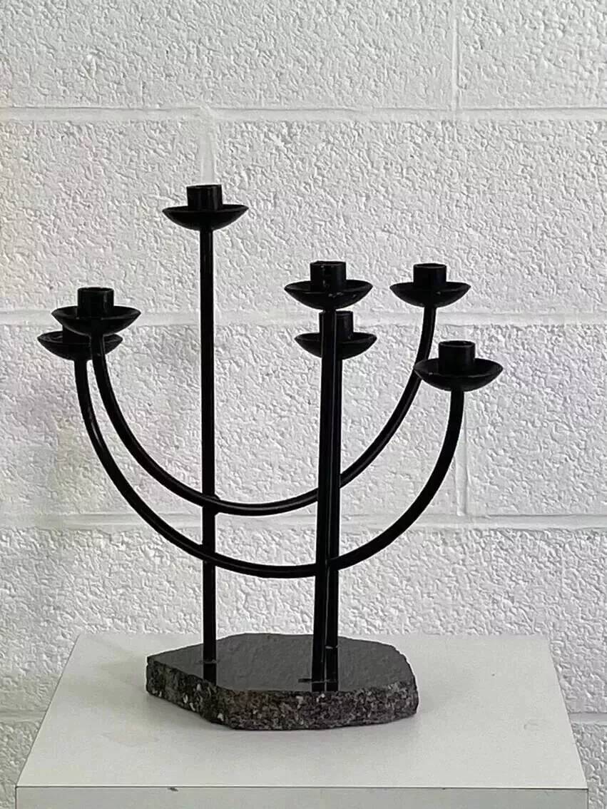 Metal candle holder and black quartz base
