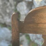 Pair of armchairs in stained wood and leather, 20th century