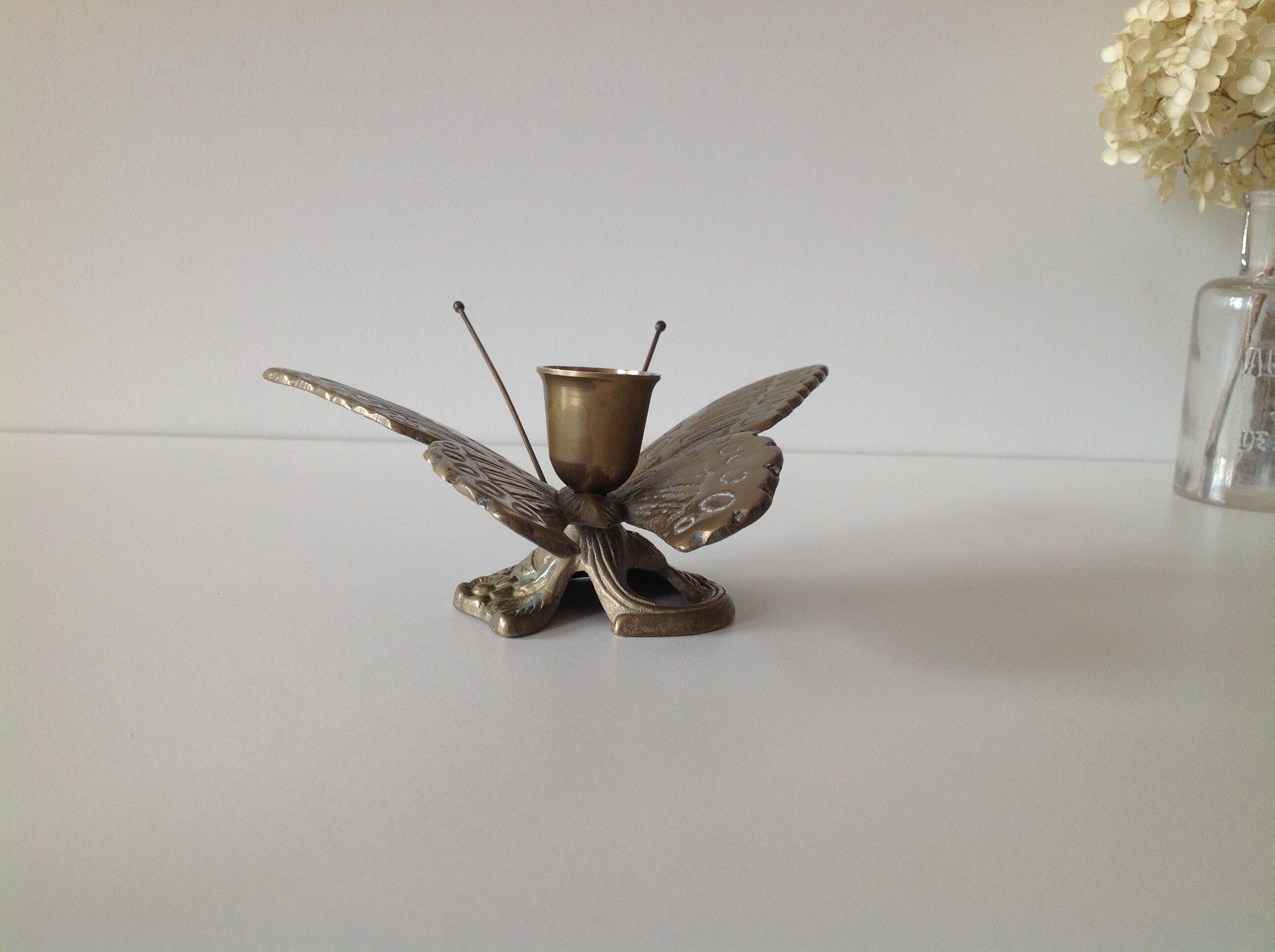 Brass butterfly candlestick