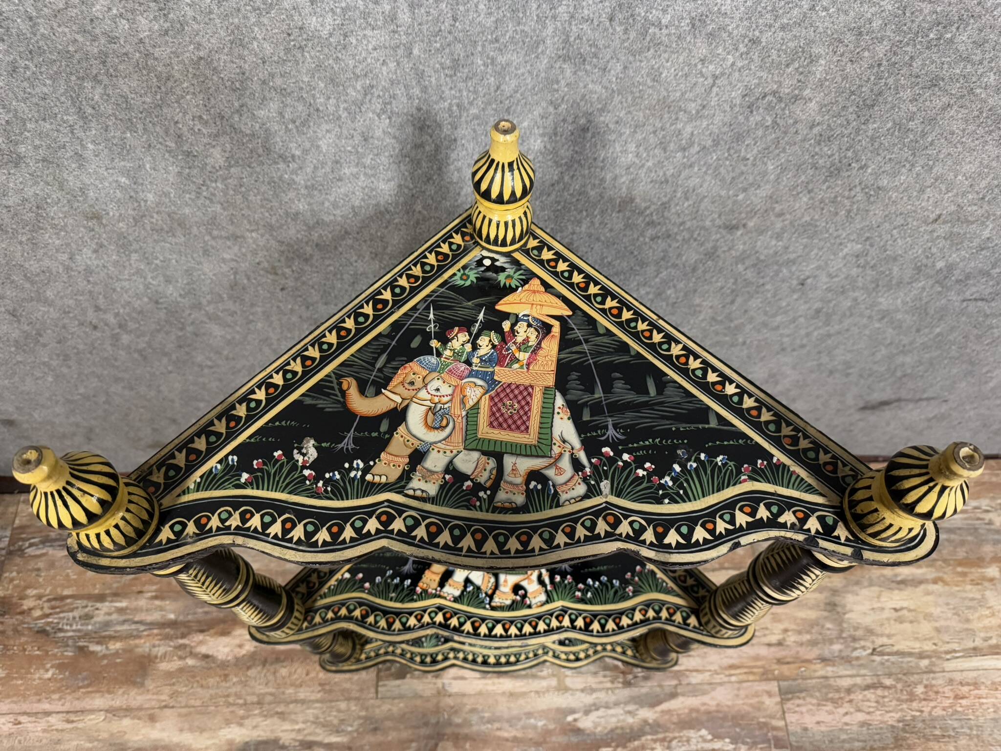 India circa 1900: attractive corner shelf in lacquered and painted wood