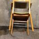 Fauteuil bridge skaï jaune et bois