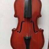 violin and decorative archer in antique varnished wood