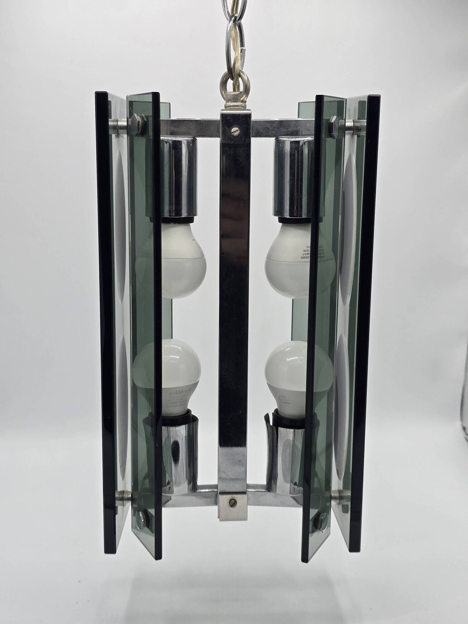 Green-grey glass and chrome metal suspension, in the style of Fontana Arte.