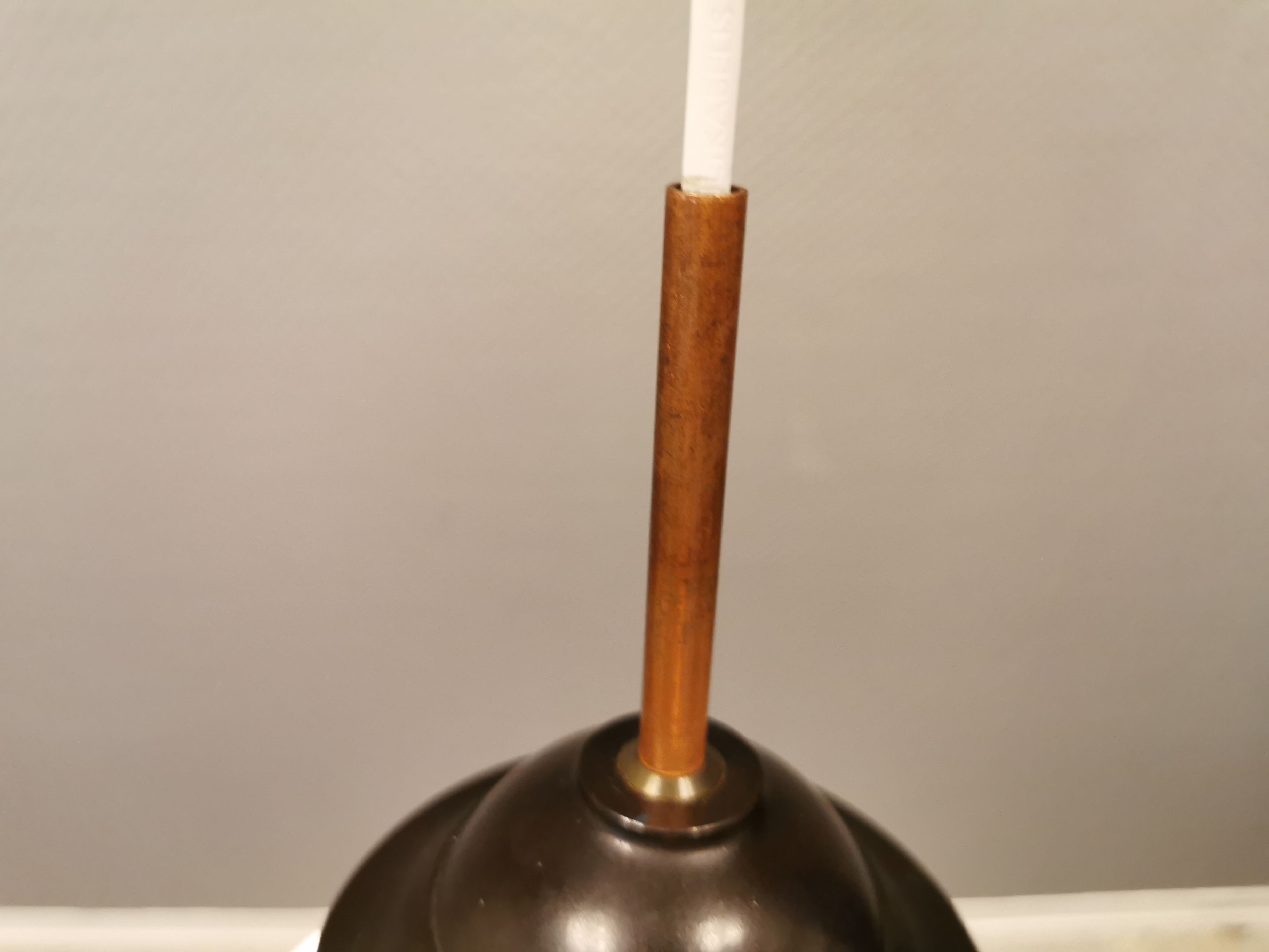 Small Art Deco hanging lamp in cream coloured glass and bakelite top.