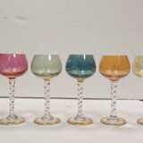 Set of 6 colored crystal stemmed glasses with gold twisted foot.