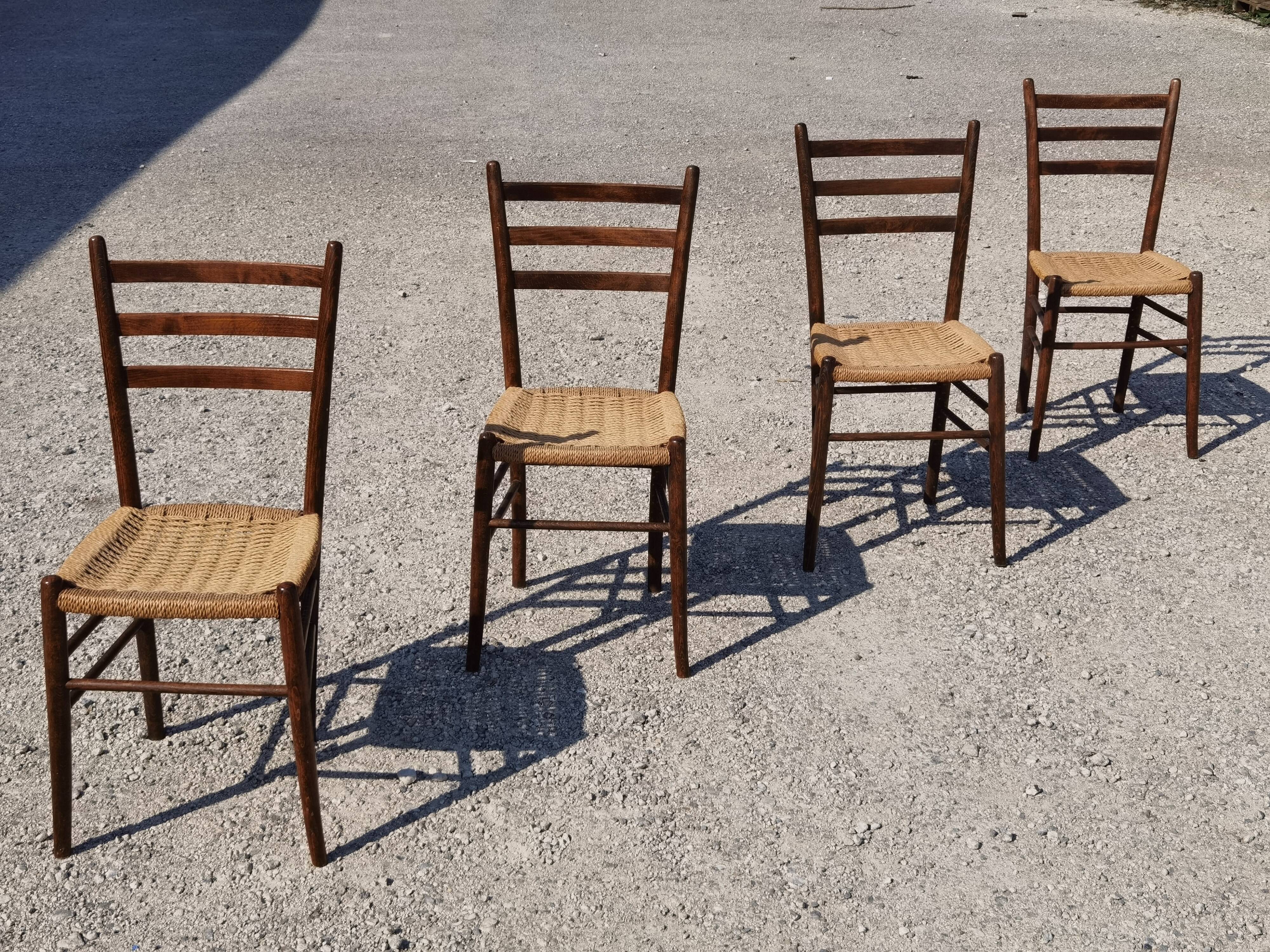 Set of 4 wooden chairs and rope