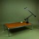 Vintage 1970s coffee table in chrome and burl wood.