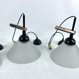 Rare Set of four Italian Modern brass and Murano glass wall lamps by Quattrifolio. 1970s