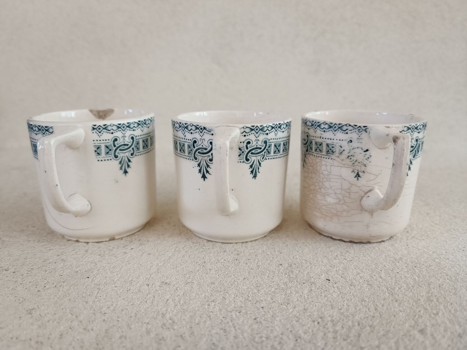 3 cups and saucers iron earth