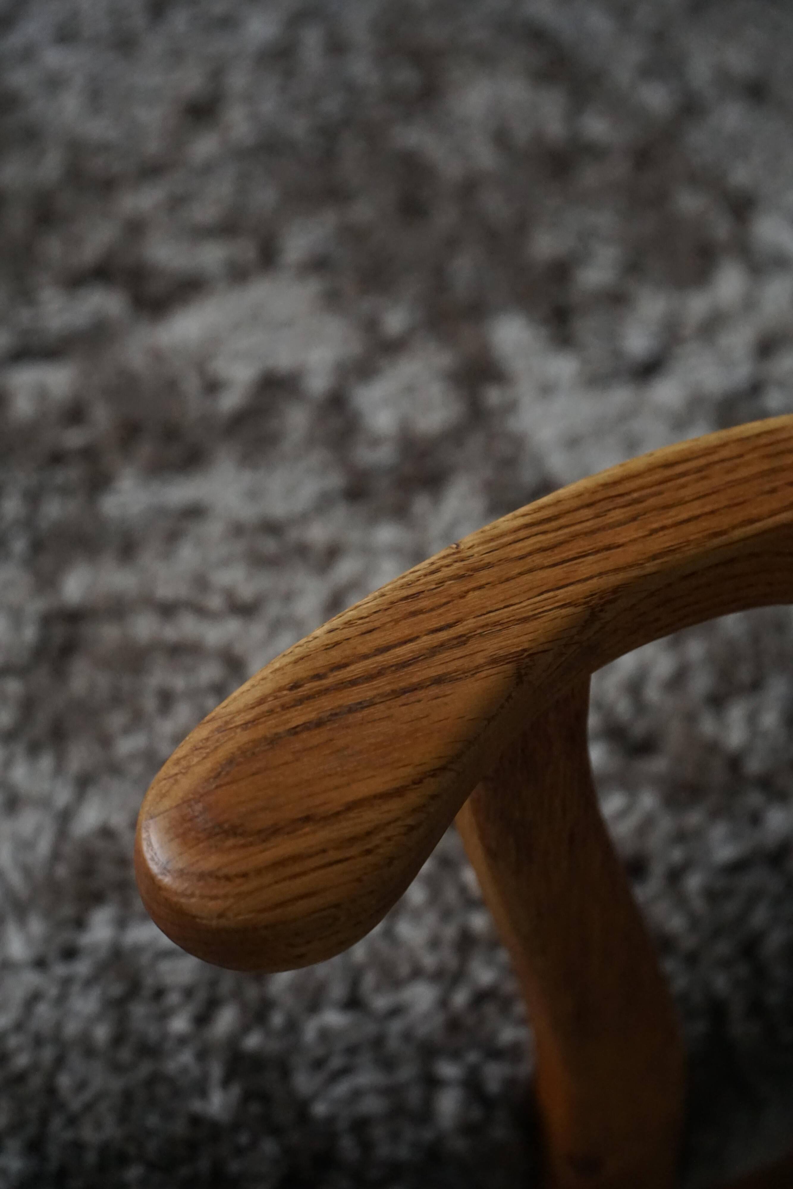 Razorblade armchair from the mid-20th century by Henning Kjærnulf, oak and lambswool, 1960.