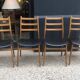 4 chaises années 60/70 bois et skaï noir