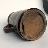 Plum and soft green varnished earth pitcher