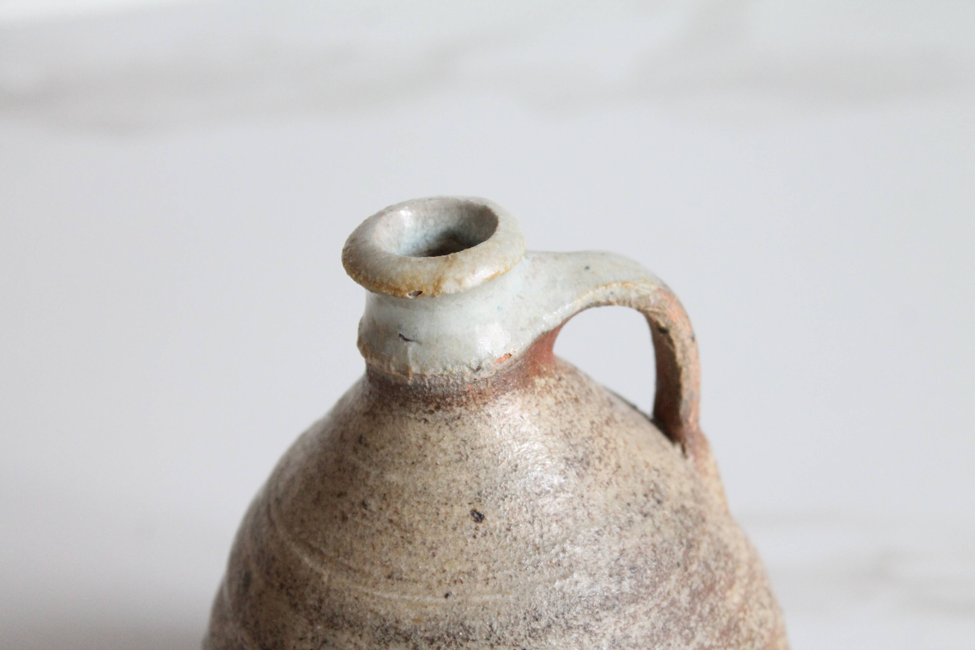 Carafe or vase in ancient glazed stoneware French pottery.
