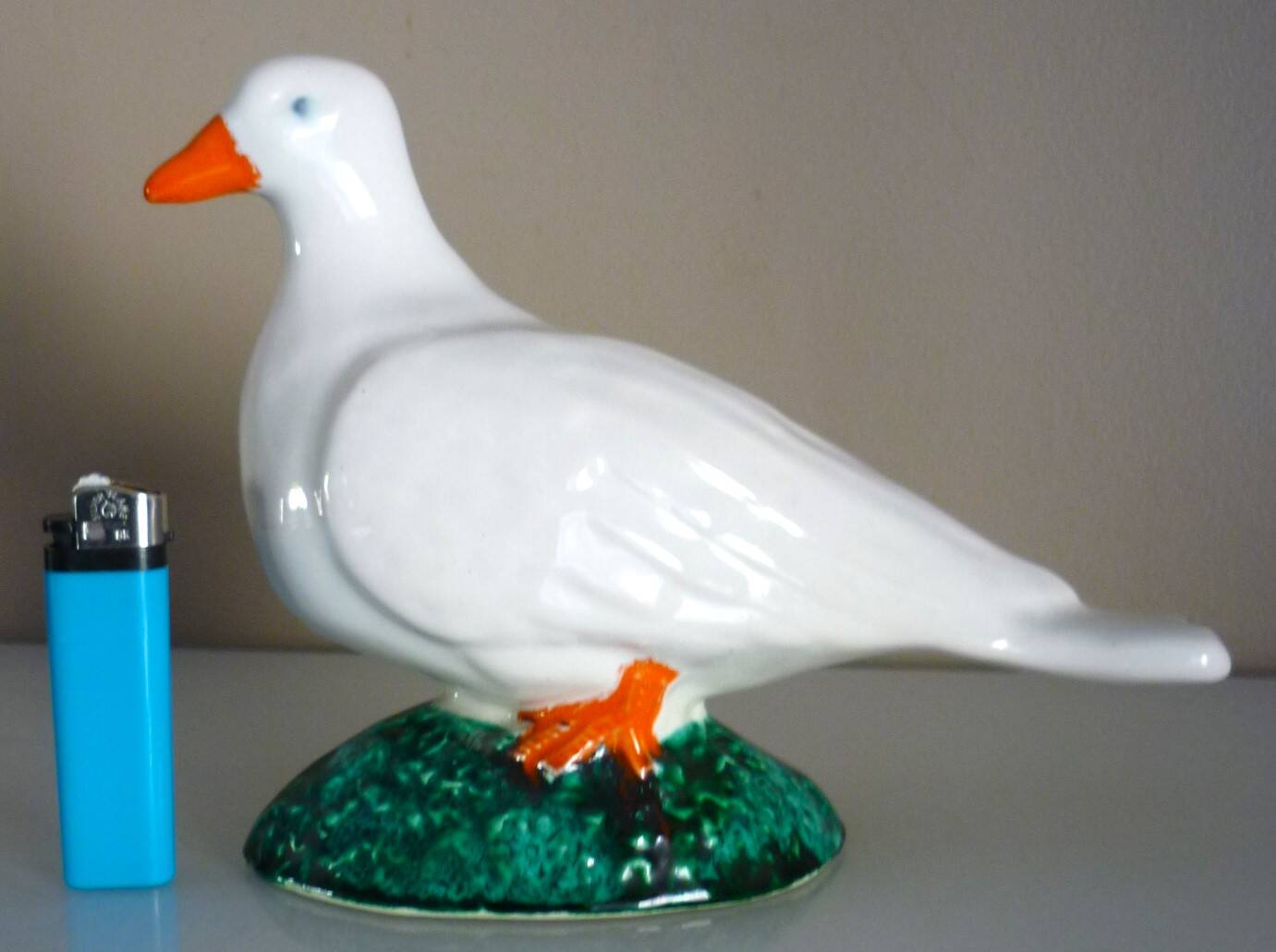 Glazed ceramic bird, signed Vallauris with bright colors