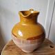 Antique glazed terracotta pitcher, brown semi-glazed jug, vase