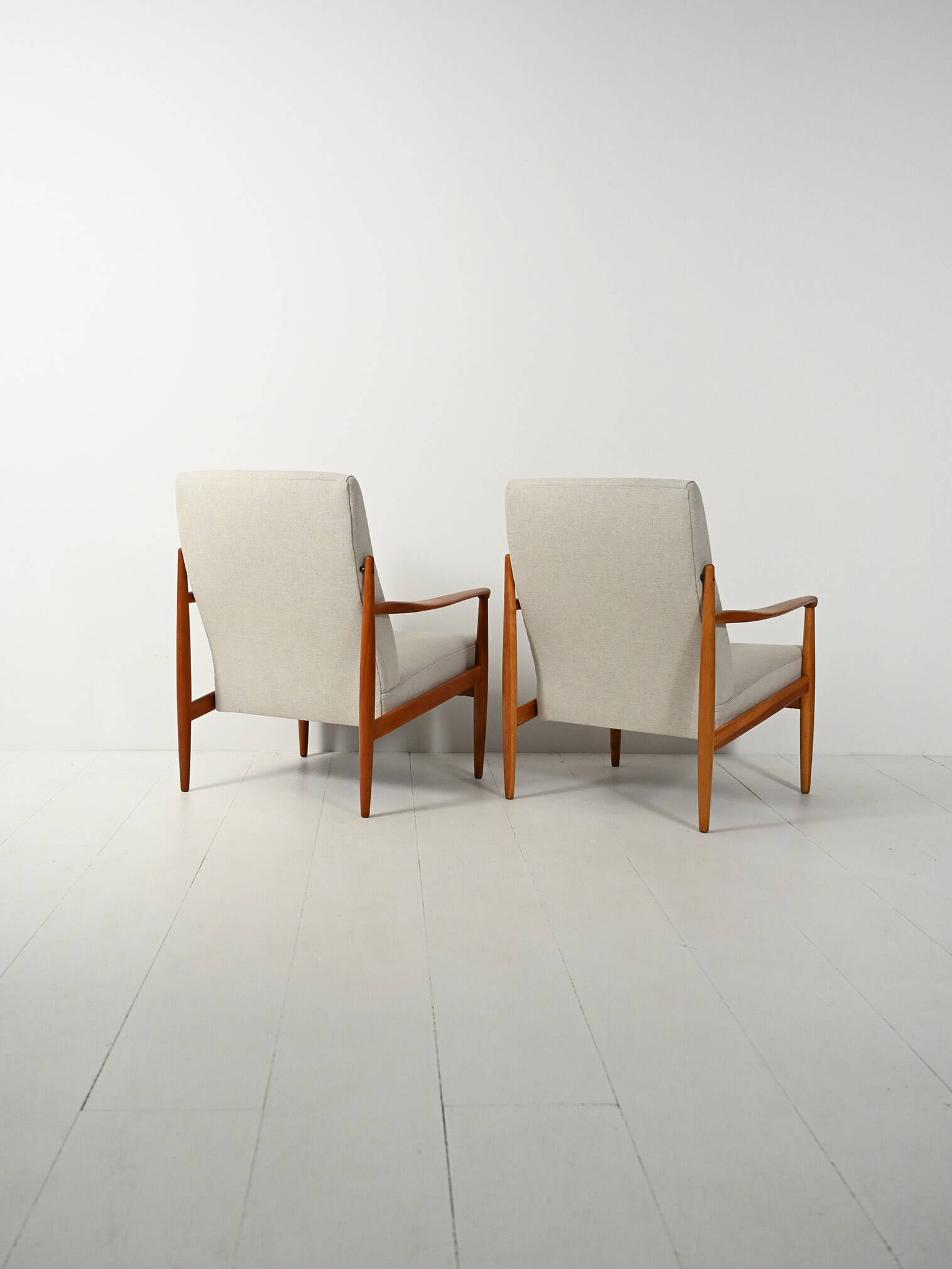 Pair of Scandinavian teak armchairs, 1950s–60s