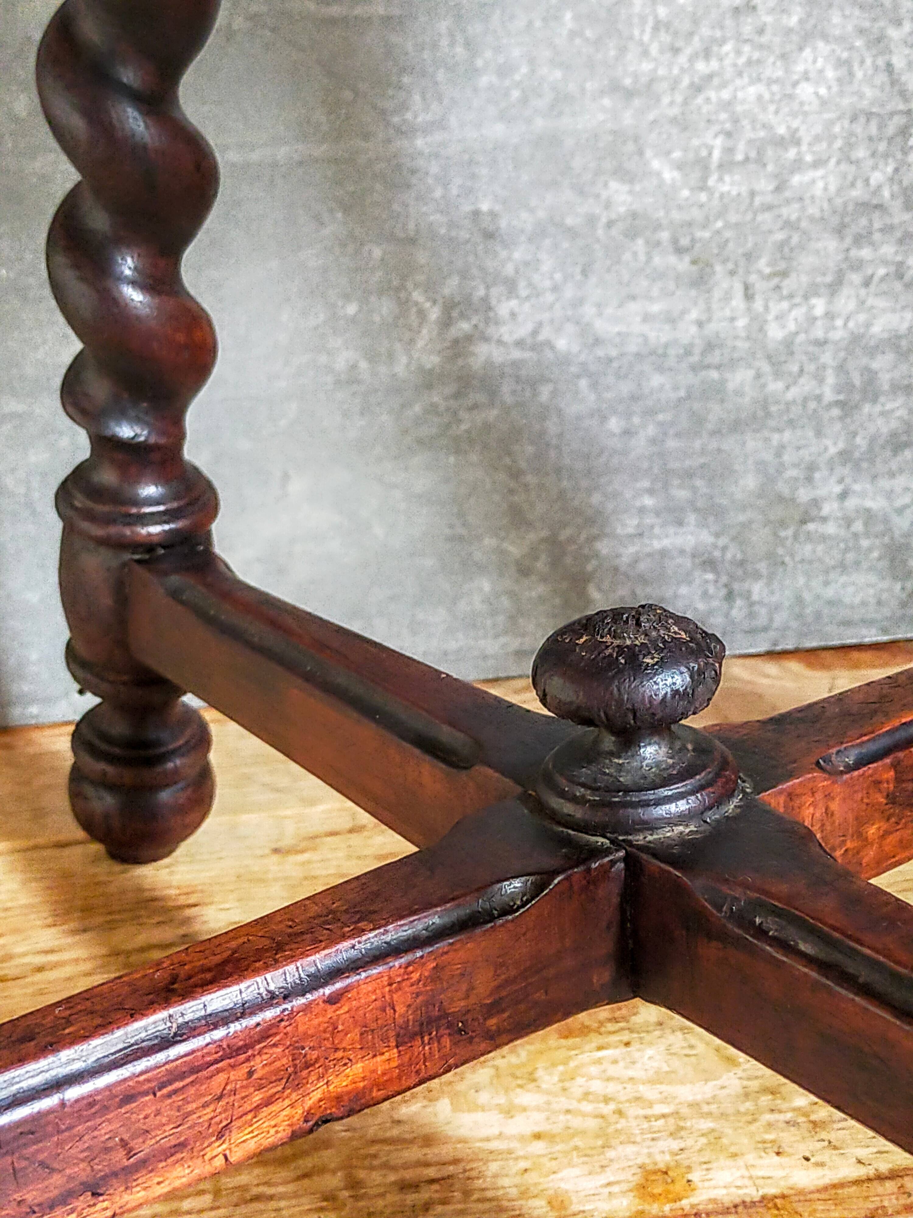 Antique stool in turned and carved solid wood
