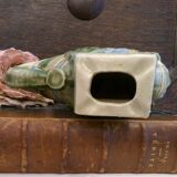 Small green ceramic elephant vase