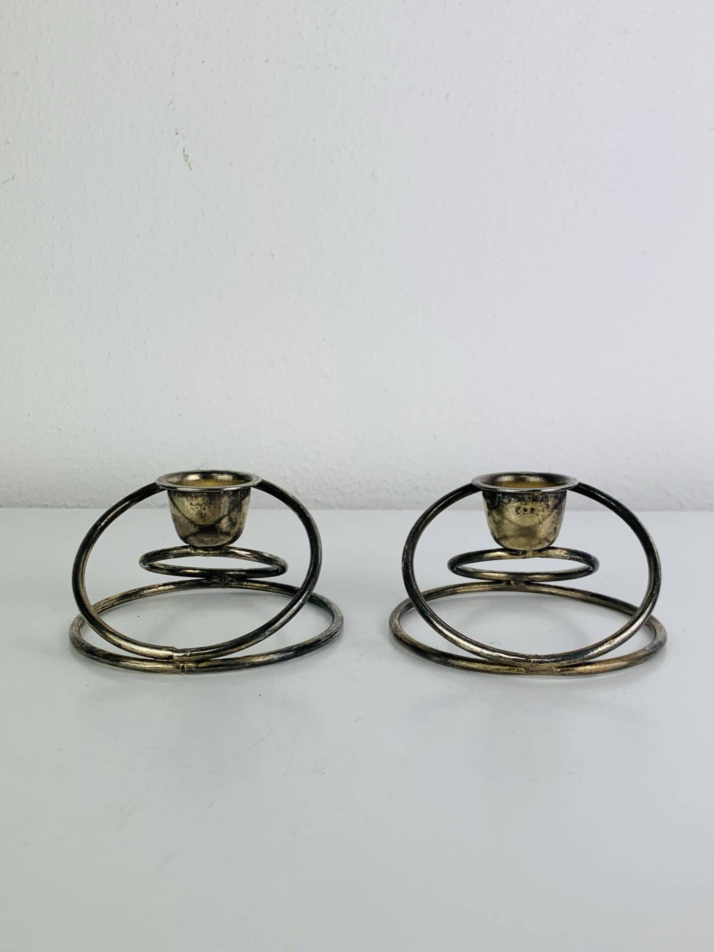 Pair of silver-plated metal candlesticks, vintage