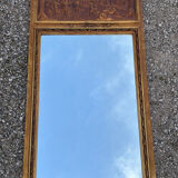 Golden trumeau mirror in Louis XVI style, 20th century.