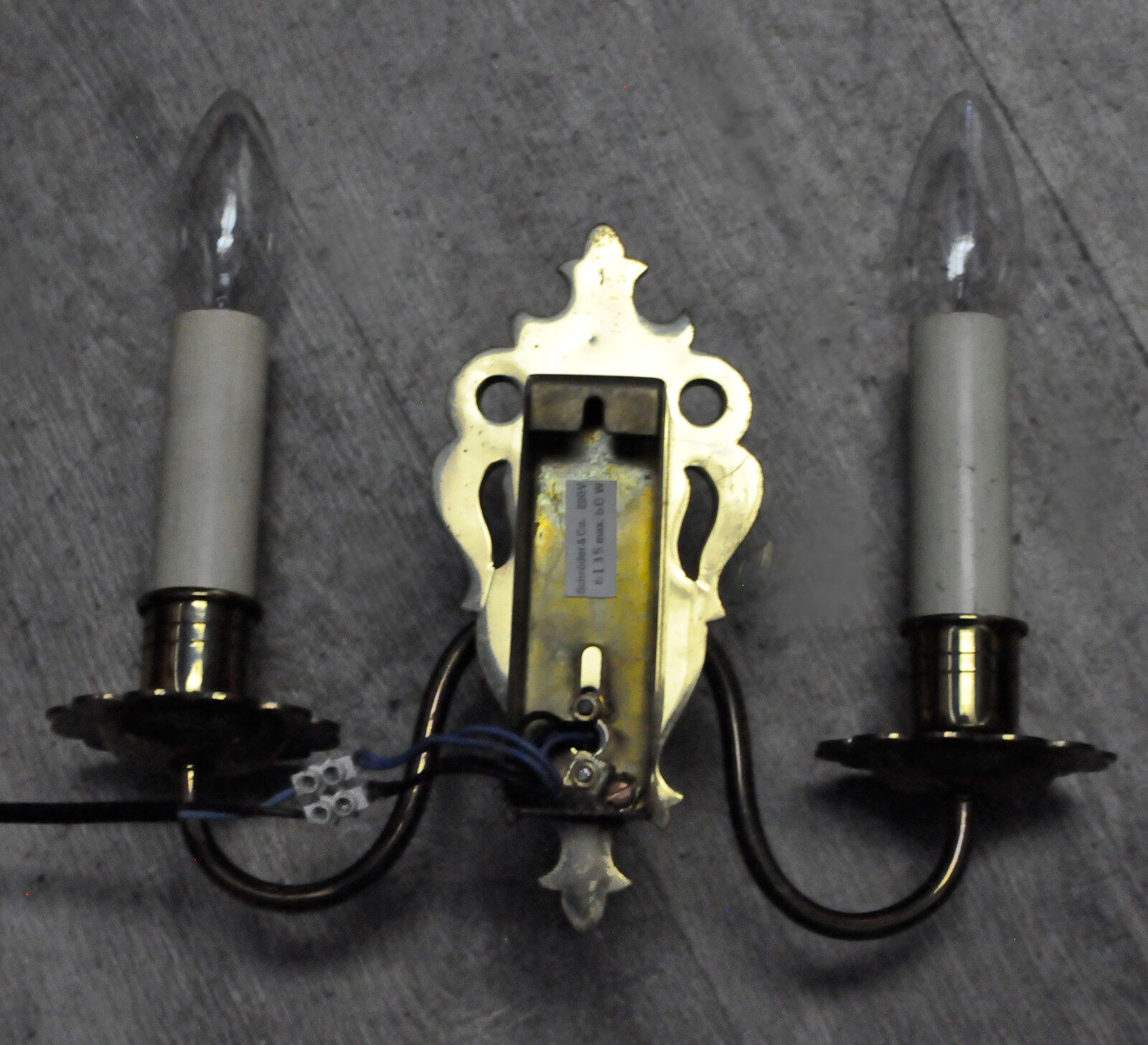 Pair of brass wall sconces by Schroder & Co