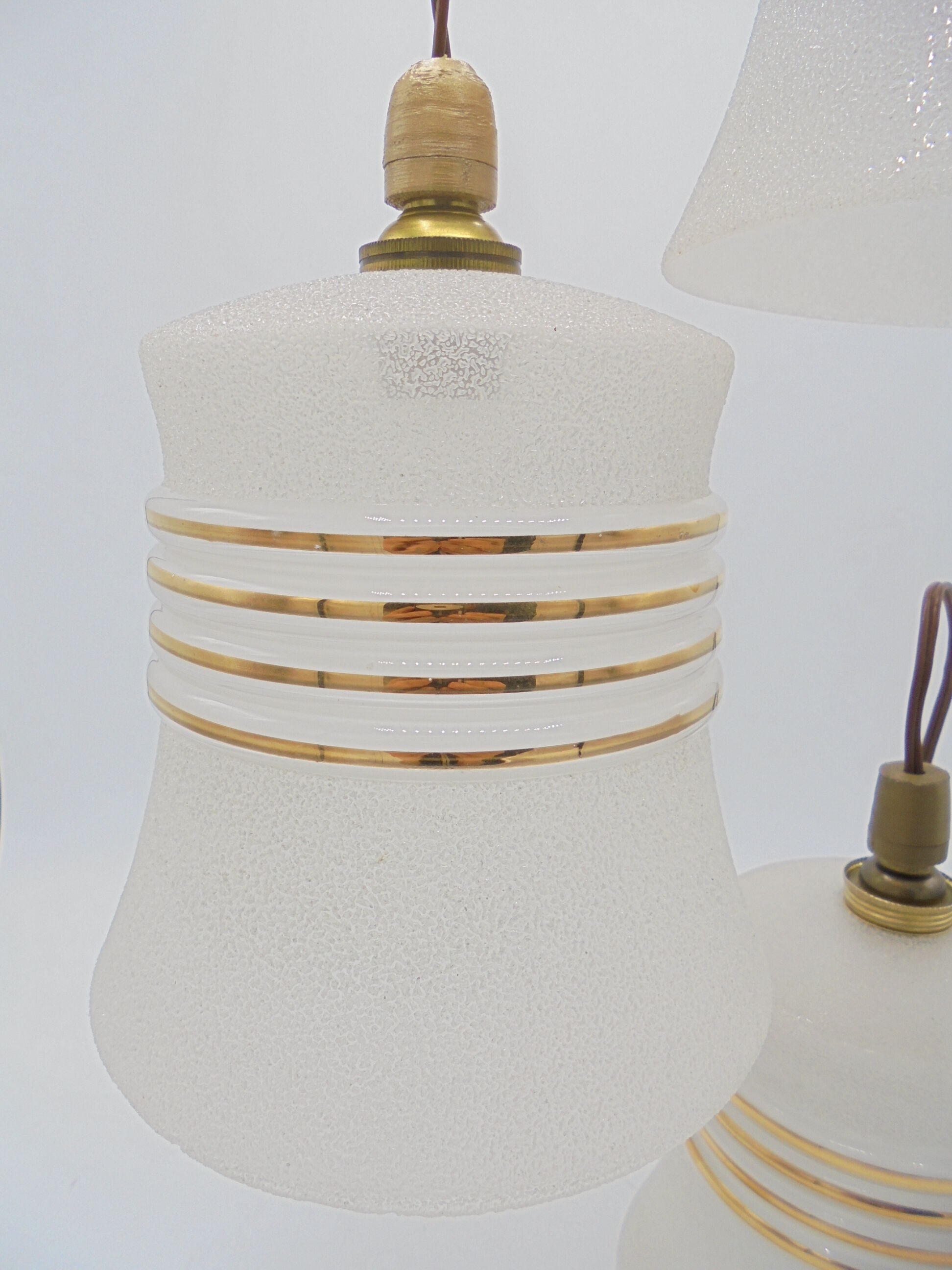 Trio of vintage suspensions