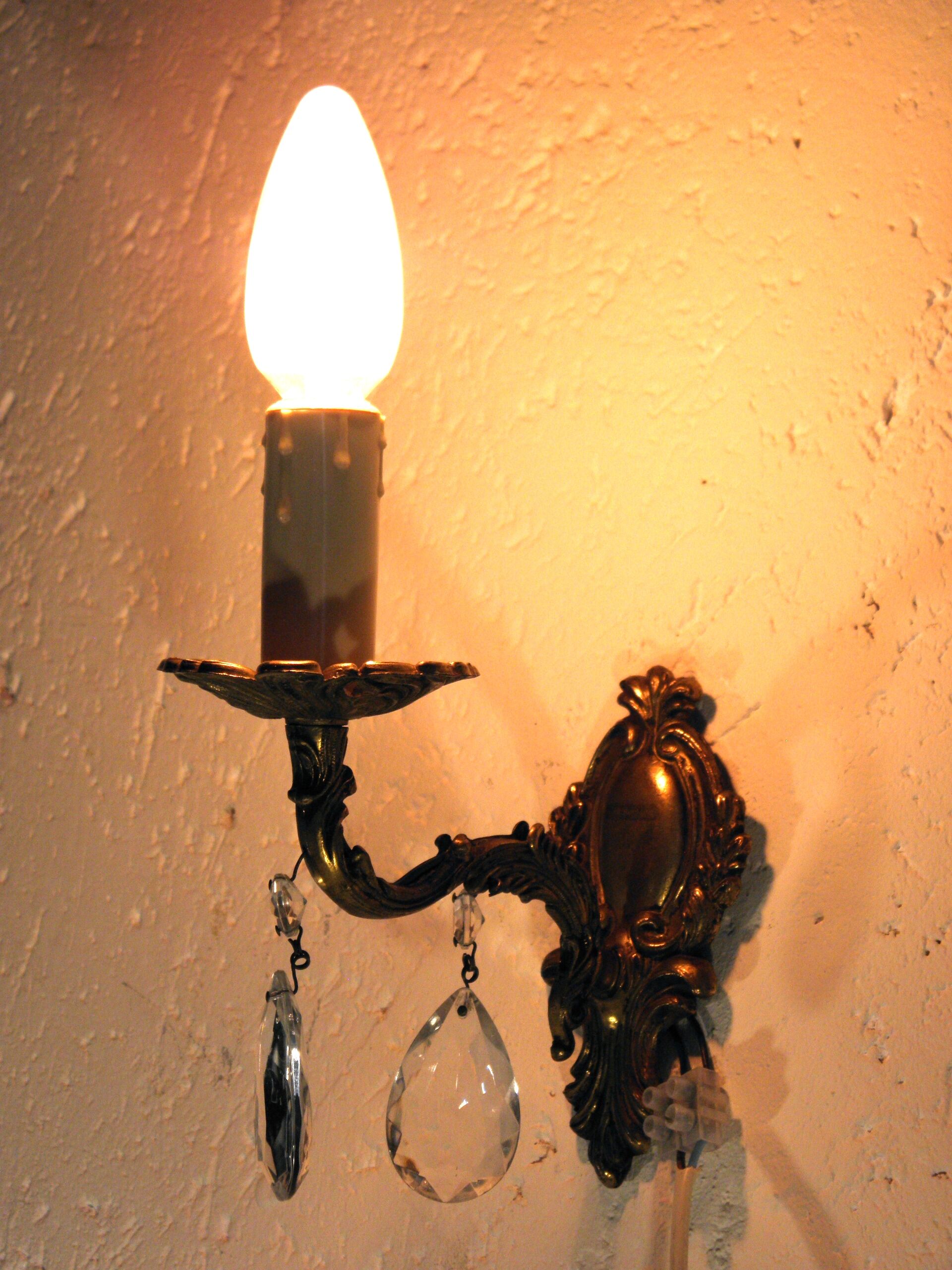 Pair of wall clams in gilded bronze stamps
