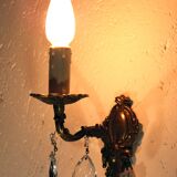 Pair of wall clams in gilded bronze stamps