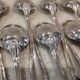 12 silver plated dessert spoons, Argental art deco goldsmith